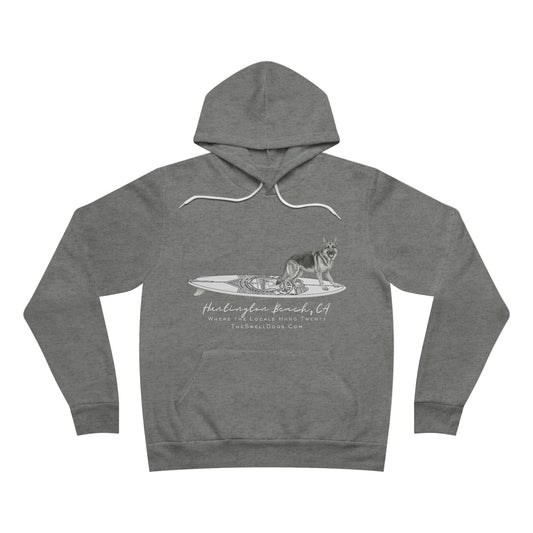Gray pullover hoodie featuring a German Shepard dog standing on a surfboard with "Huntington Beach, CA" text