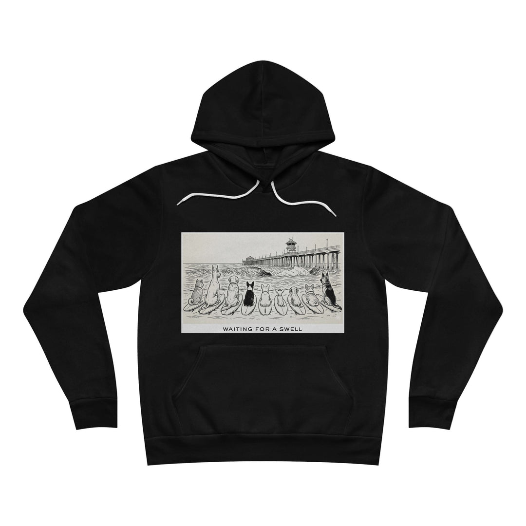 Black hoodie with graphic design of 9 dogs facing the surf south of the Huntington Beach pier waiting for a swell.