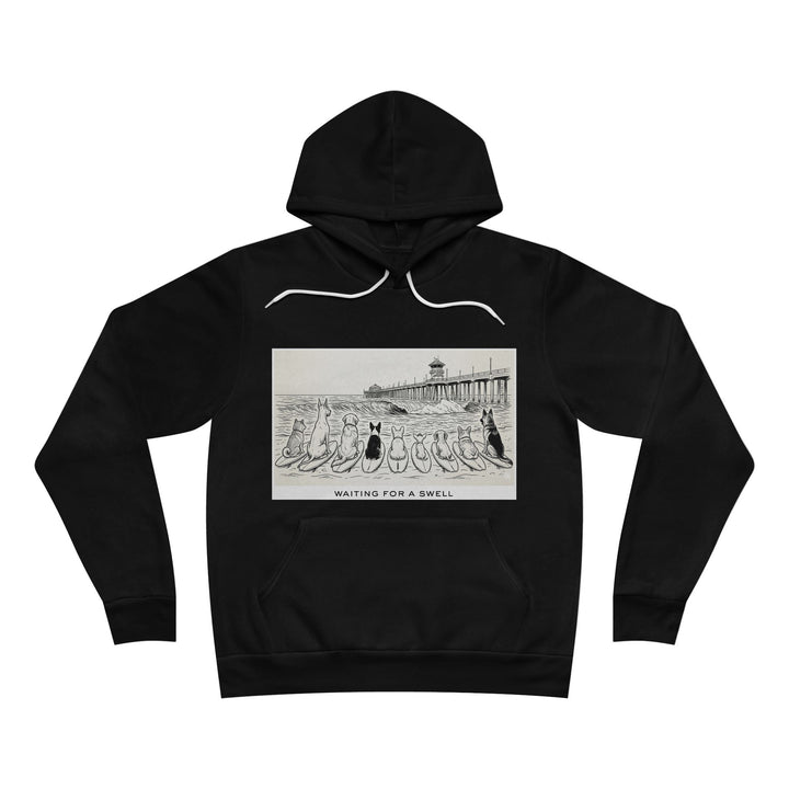 Black hoodie with graphic design of 9 dogs facing the surf south of the Huntington Beach pier waiting for a swell.