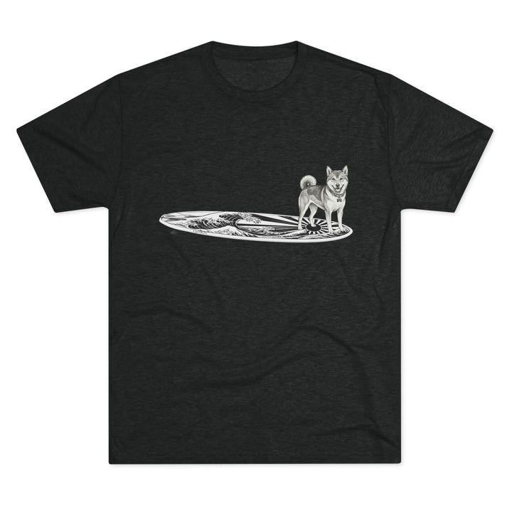 Black t-shirt with vintage Shiba Inu on a surfboard featuring rising wave and Japanese sun flag line drawing — The Swell Dogs