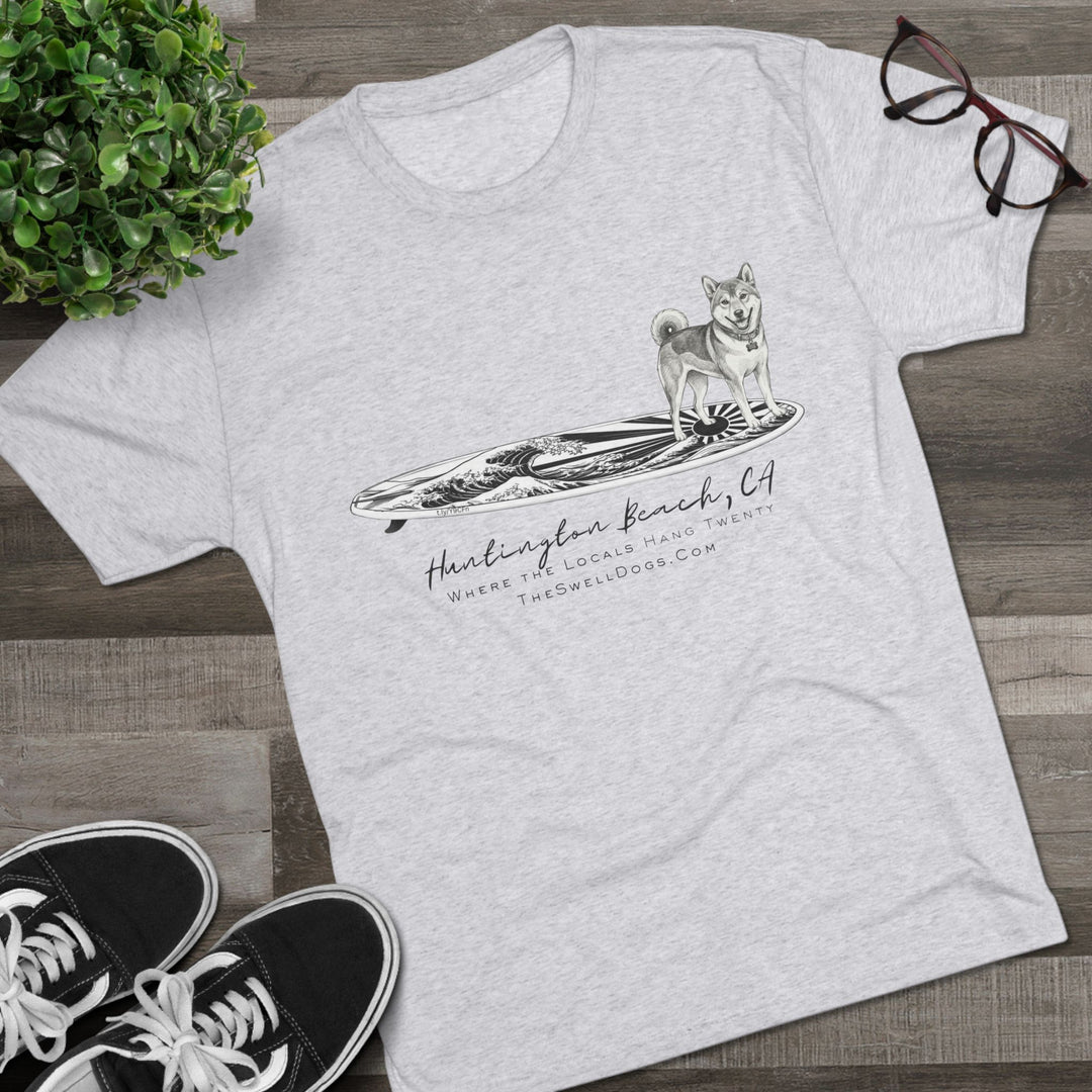 White t-shirt featuring a Shiba Inu on a Japanese surfboard with "Huntington Beach, CA" text
