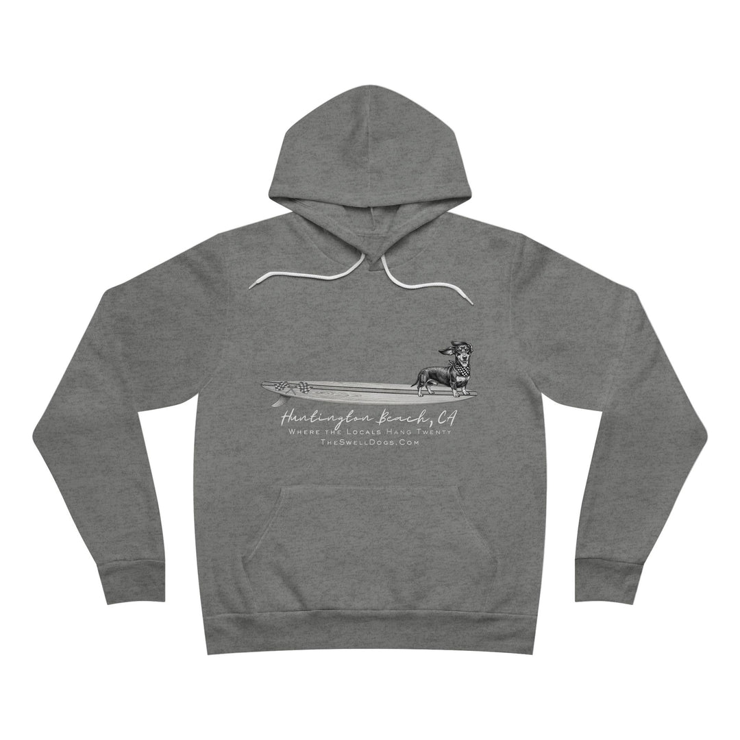 Gray pullover hoodie featuring a Dachshund dog standing on a surfboard with "Huntington Beach, CA" text