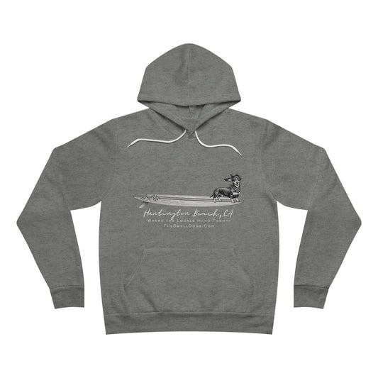 Gray pullover hoodie featuring a Dachshund dog standing on a surfboard with "Huntington Beach, CA" text