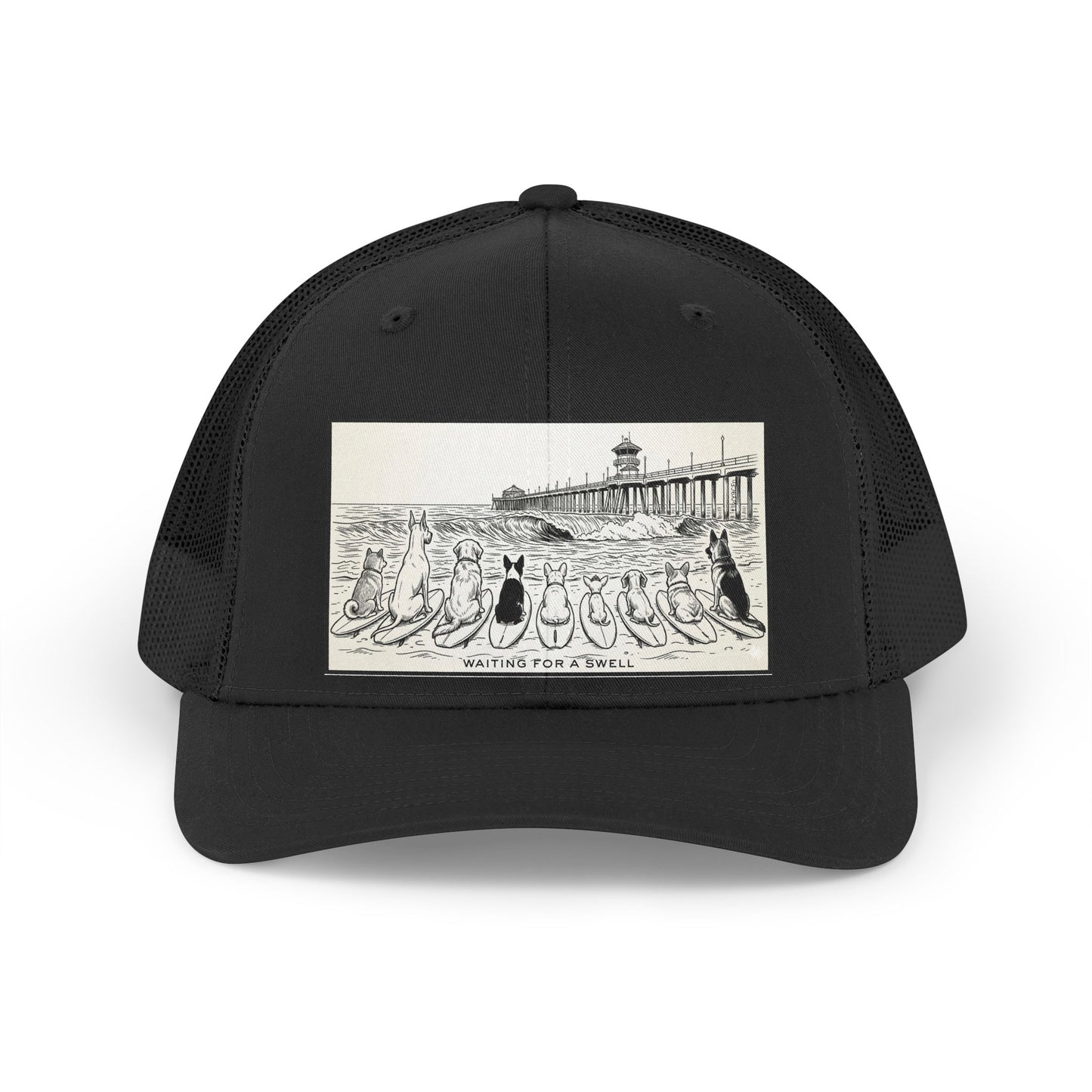 Black trucker hat with a picture of a pack of nine dogs sitting on their surfboards, facing the ocean, with the Huntington Beach pier in the background. It says Waiting for a Swell at the bottom.