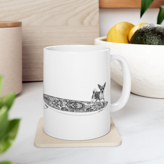White mug with a Chihuahua surfing on a Day of the Dead surfboard.