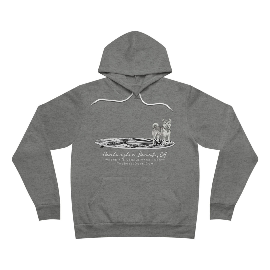 Gray pullover hoodie featuring a Shiba Inu dog standing on a surfboard with "Huntington Beach, CA" text