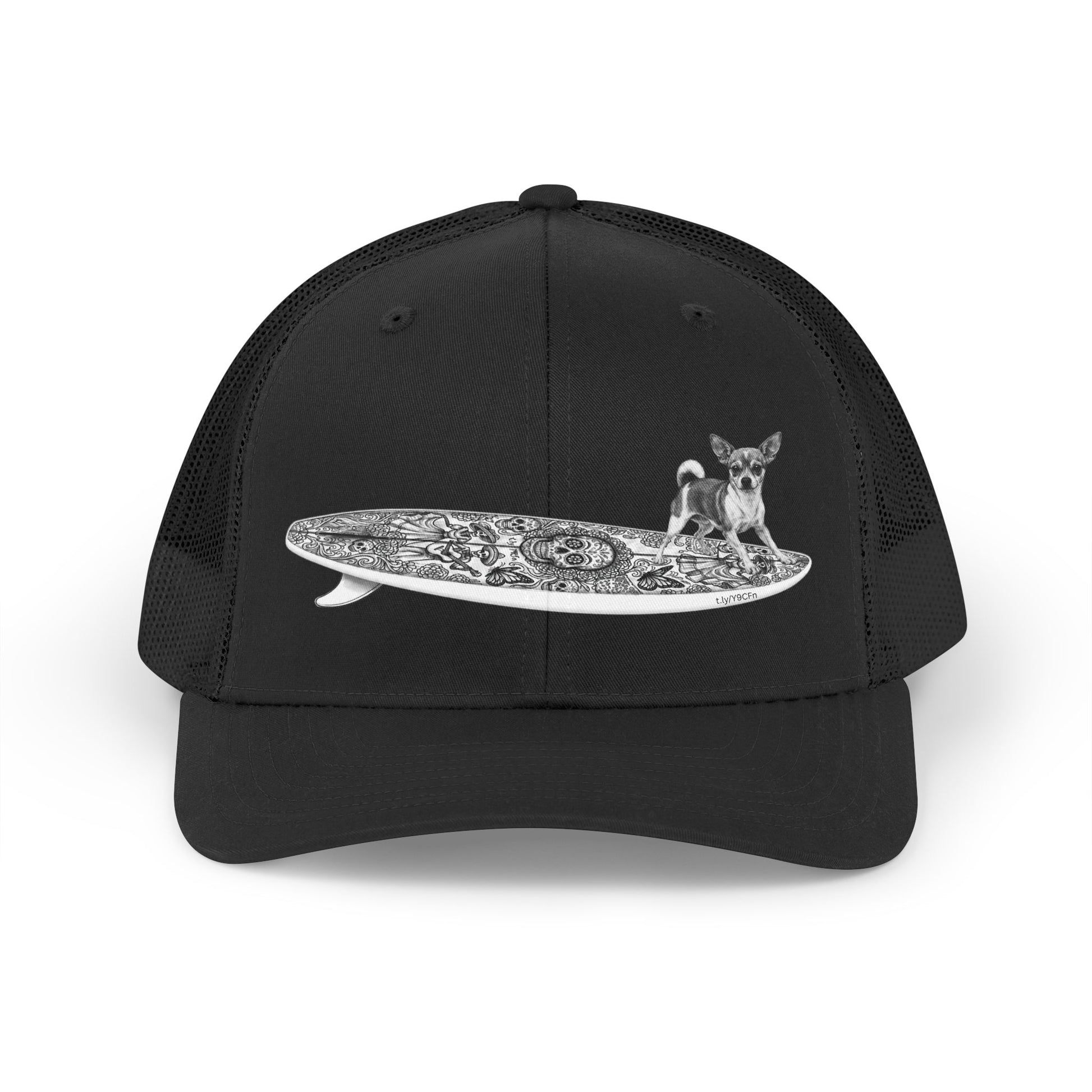 Black trucker hat with a Chihuahua surfing on a Day of the Dead surfboard. 