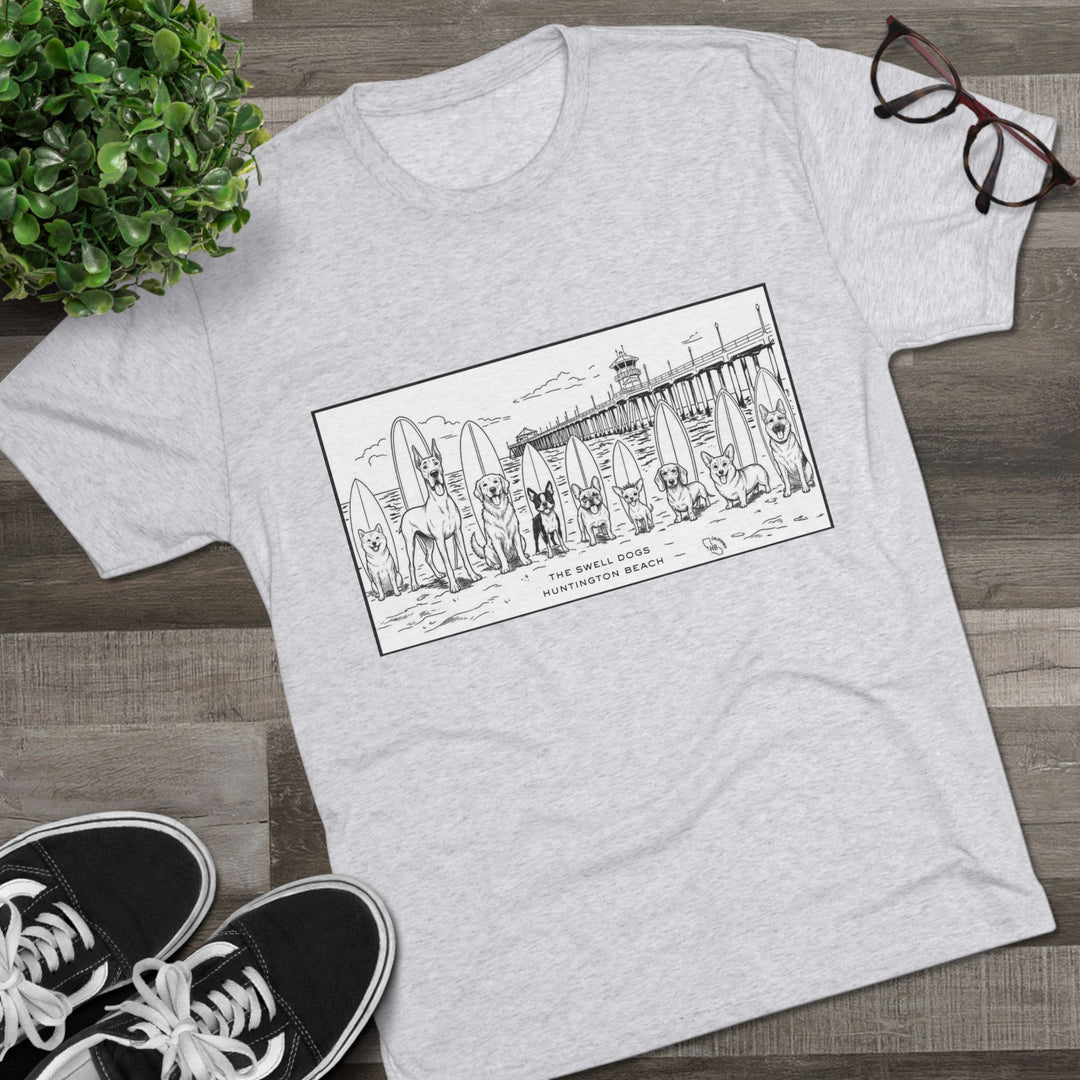 White t-shirt featuring nine different dogs with surfboards sitting in front of the HB pier with “Huntington Beach” text