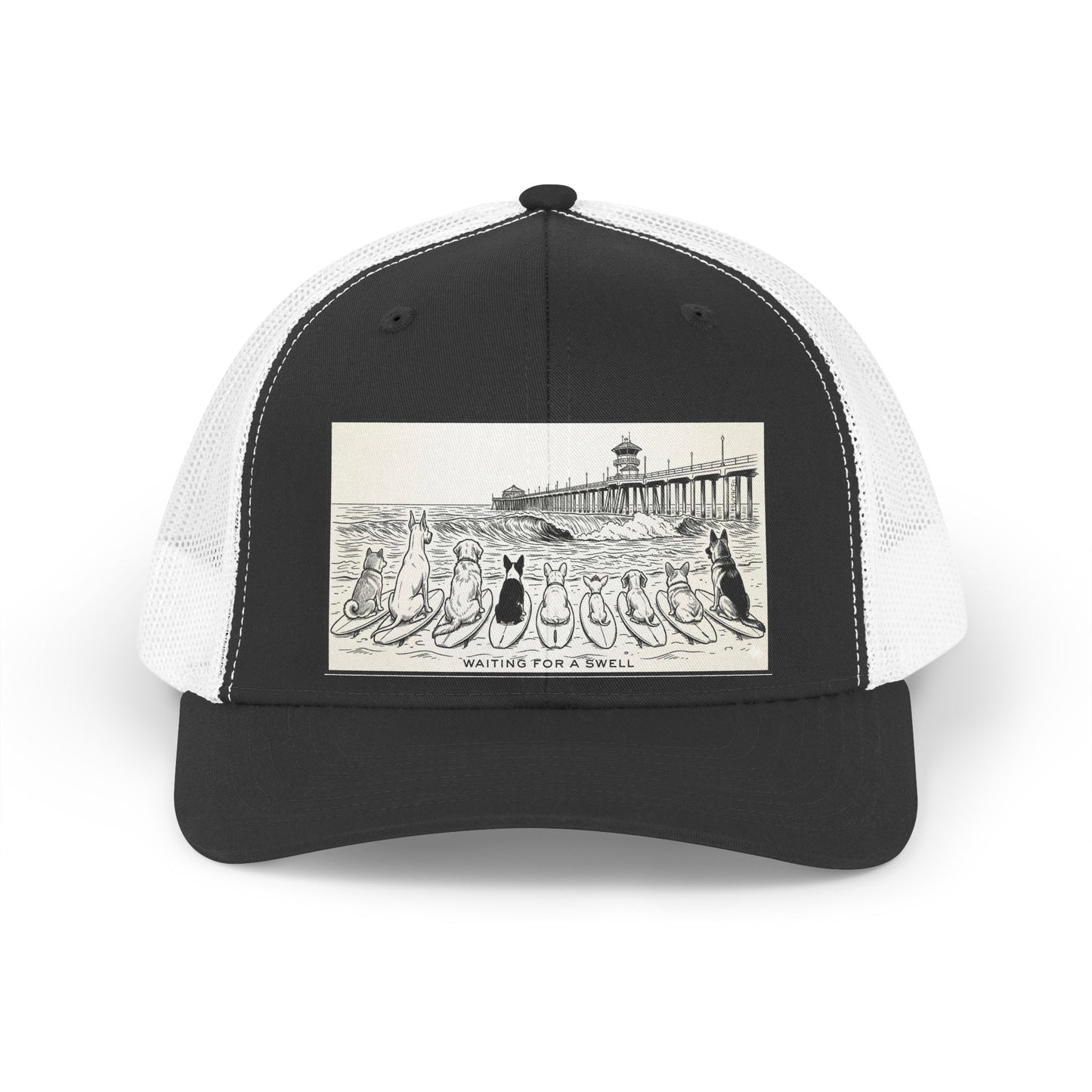 Black and white trucker hat with a picture of a pack of nine dogs sitting on their surfboards, facing the ocean, with the Huntington Beach pier in the background. It says Waiting for a Swell at the bottom.