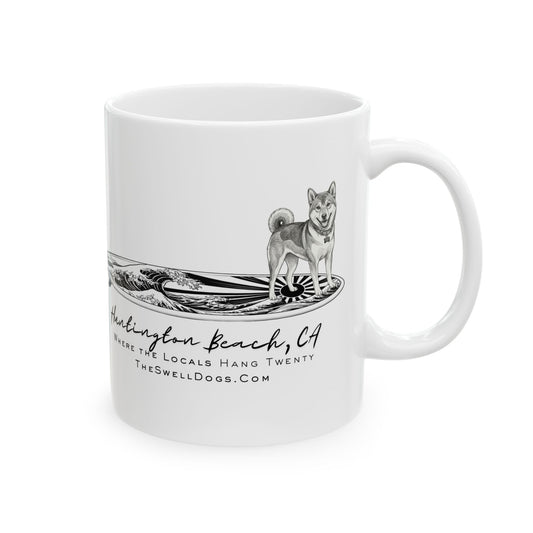 White mug featuring a Shiba Inu standing on a Japanese surfboard with “Huntington Beach, CA” text
