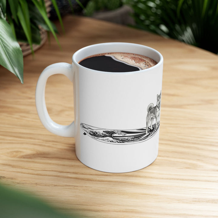 Shiba Inu surf mug with rising wave and Japanese sun flag surfboard line art styled on wood surface with green plants — The Swell Dogs