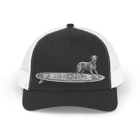 Black and white trucker hat with a Great Dane on a longboard with wild boar crests and suns on it.