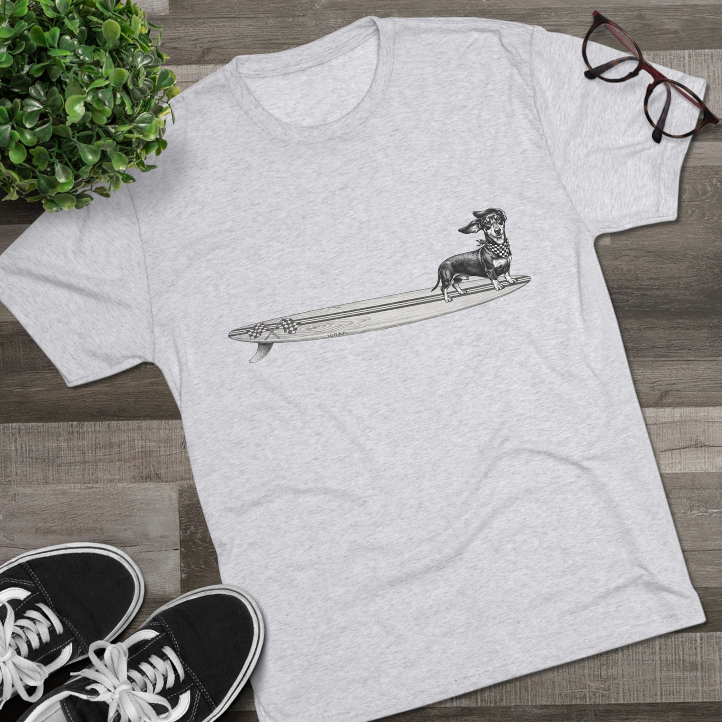 Light heather grey Dachshund surf t-shirt with checkered racing flag bandana and wood grain surfboard illustration styled with Vans and sunglasses — The Swell Dogs
