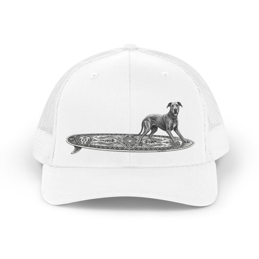 White  trucker hat with a Great Dane on a celtic knoit surfboard.  with a dog on a surfboard design on a white background