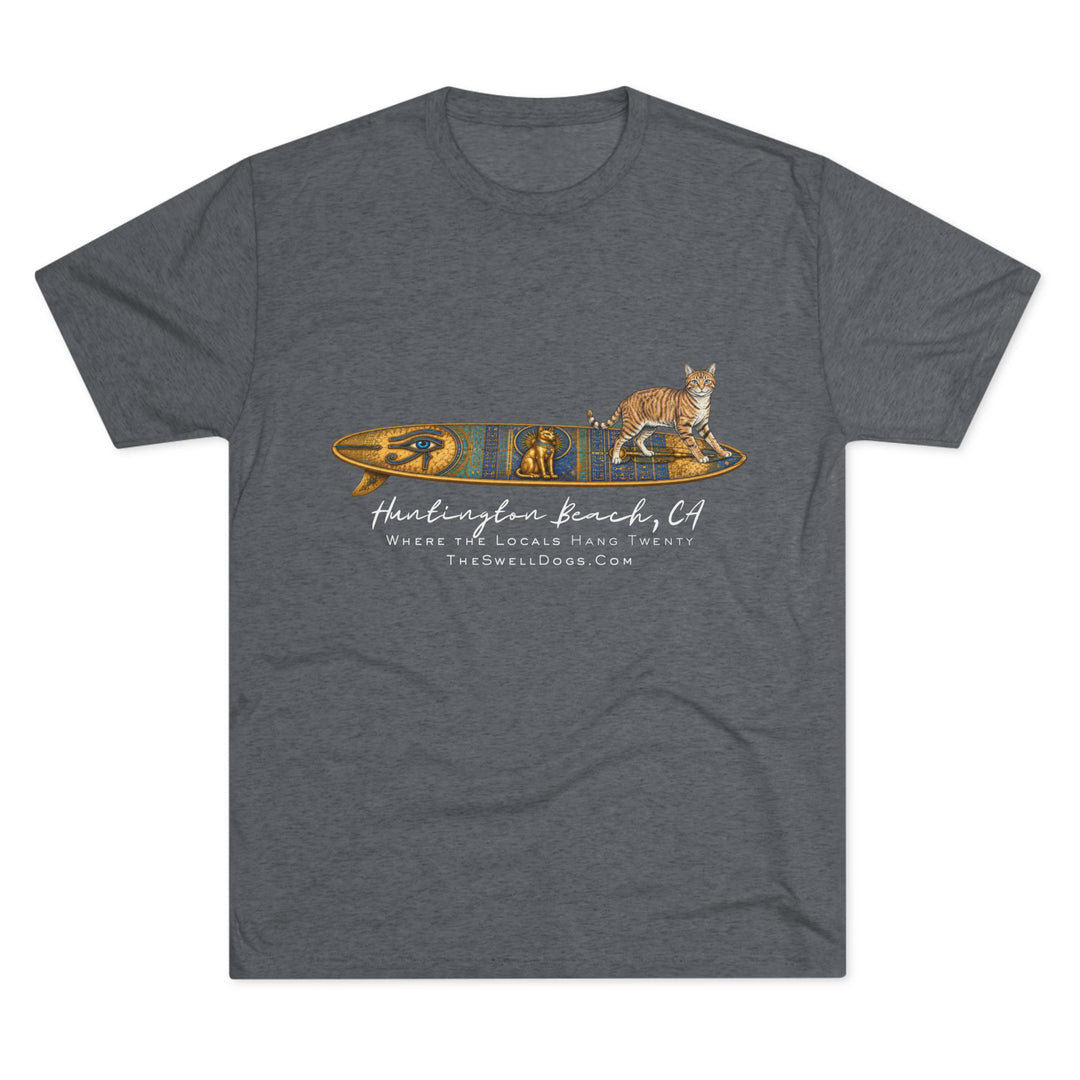 Grey t-shirt featuring a tabby cat standing on an Egyptian surfboard with "Huntington Beach, CA" text
