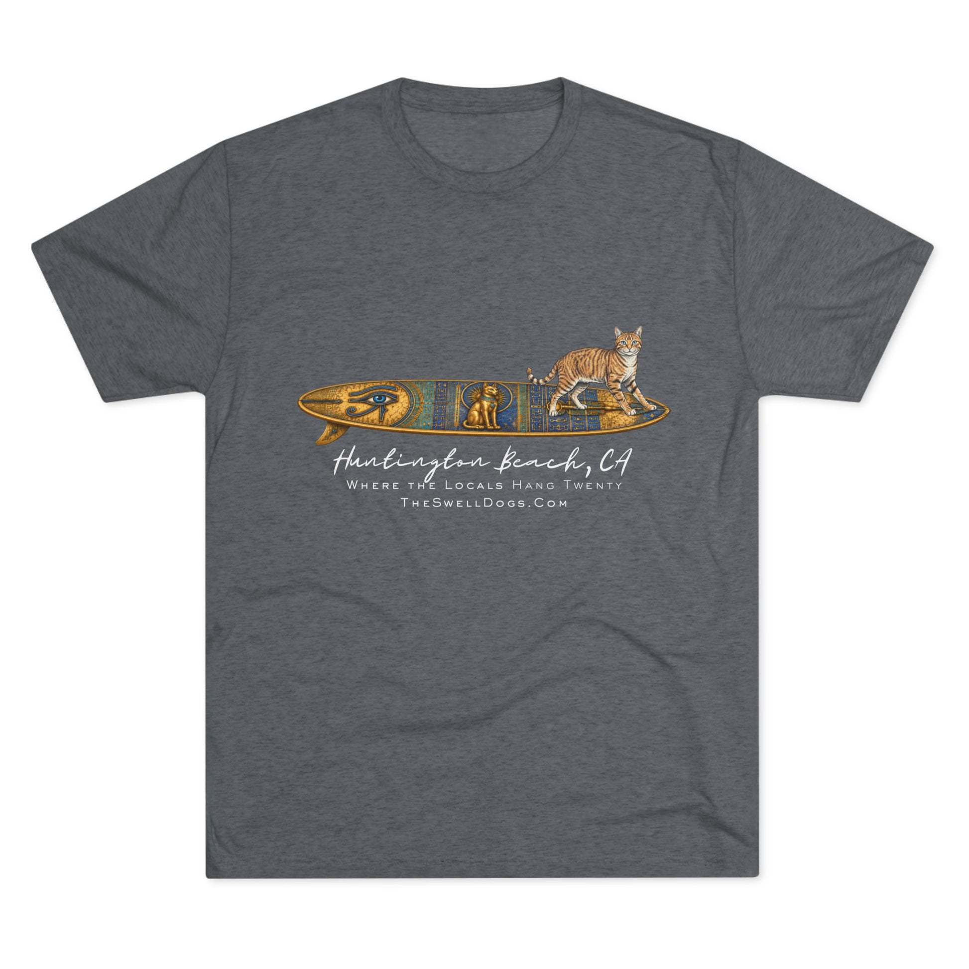 Grey t-shirt featuring a tabby cat standing on an Egyptian surfboard with "Huntington Beach, CA" text