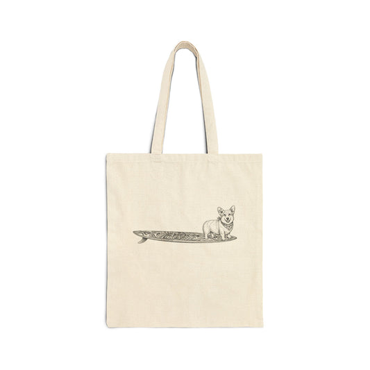 Natural canvas tote bag with Corgi in hibiscus bandana and hibiscus ear flower on a tiki surfboard illustration — The Swell Dogs