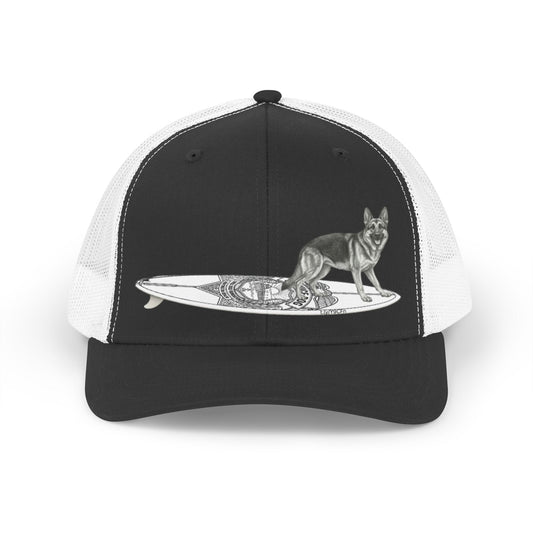 Black and white trucker hat with a German Shepherd dog on a surfboard designed  with a service badge on it.
