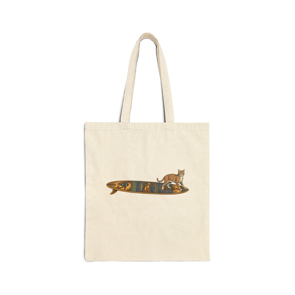 Beige tote bag featuring a tabby cat standing on an Egyptian surfboard