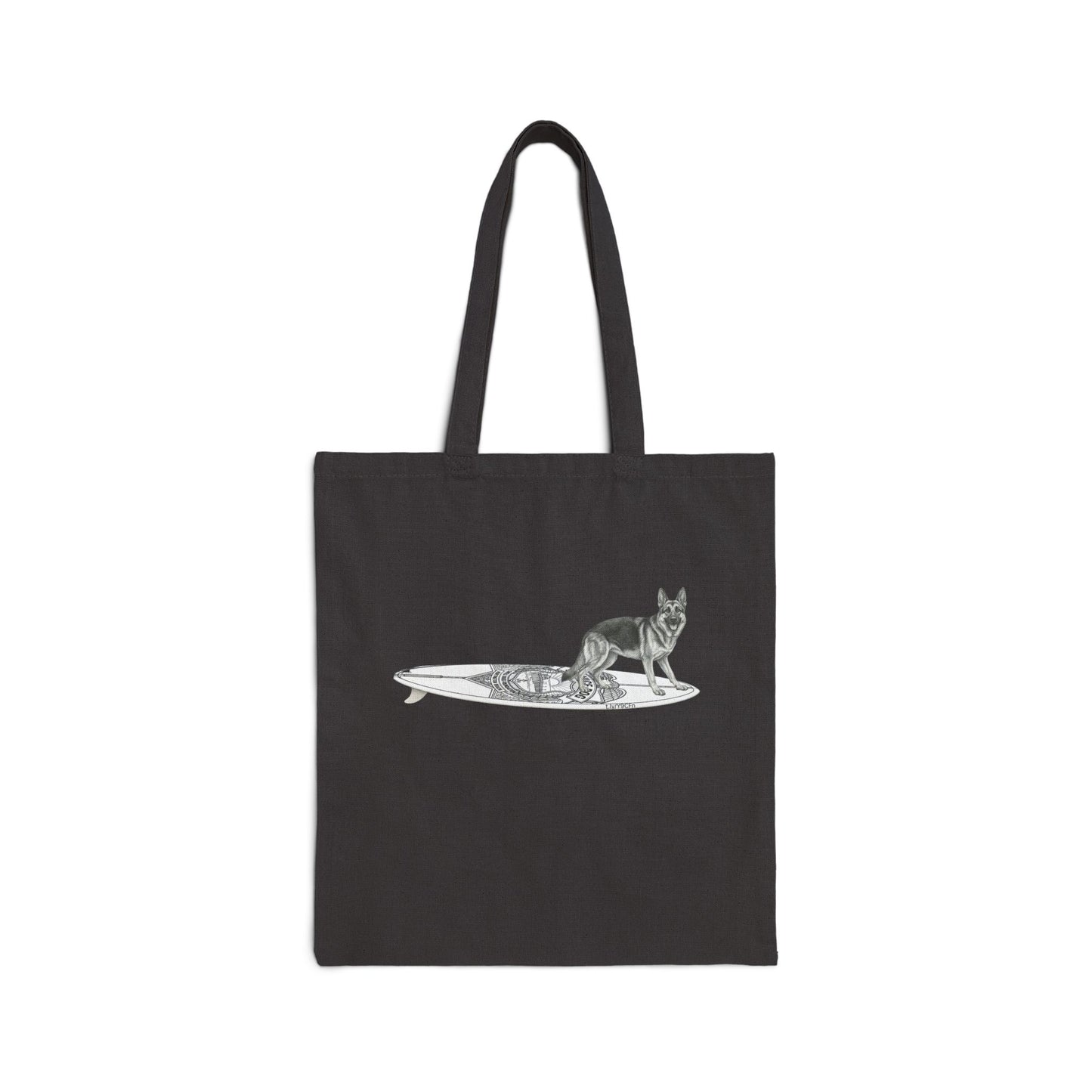 Black tote bag with a German Shepherd dog on a service dog long surfboard.