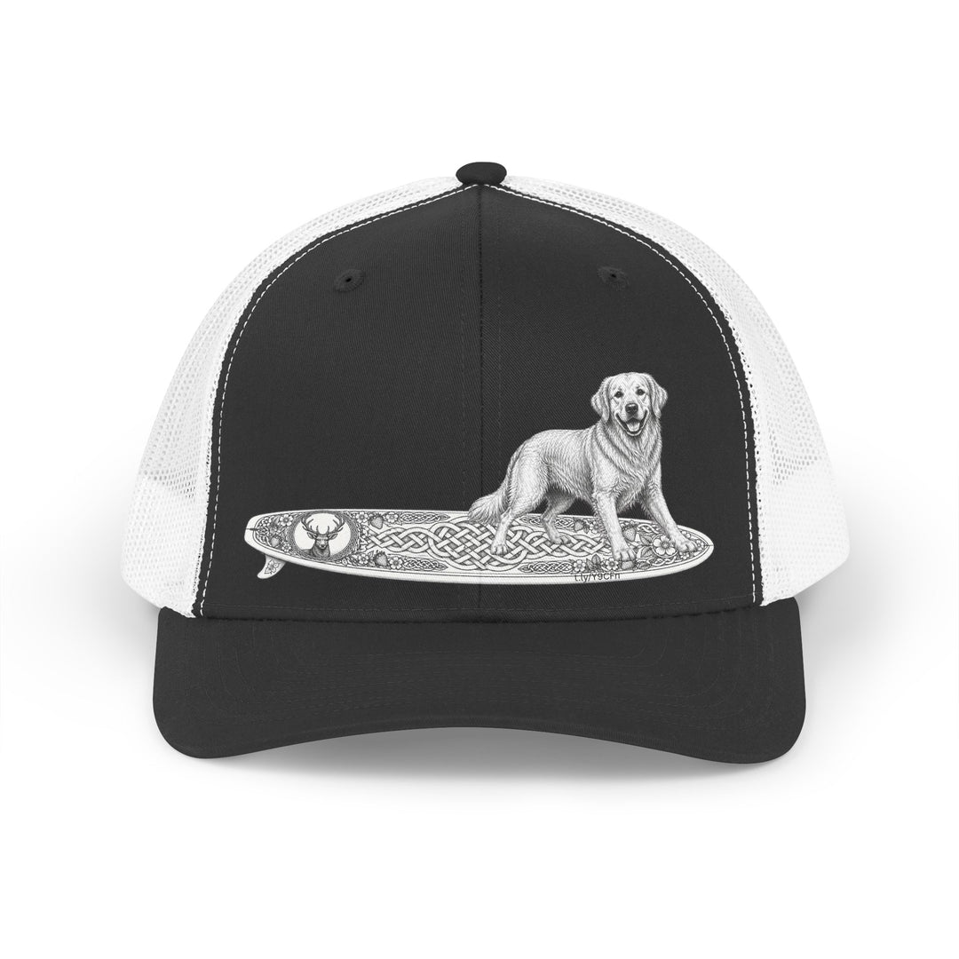 Black and white trucker hat with a Golden Retriever riding a long surfboard with keltic knots and embellishments.cap with a dog on a surfboard design