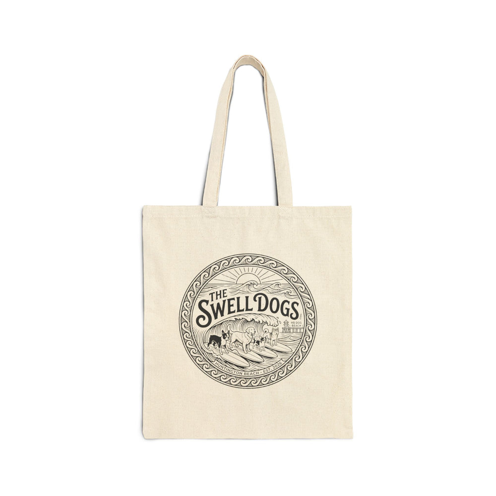 Beige tote bag with a Swell Dogs logo.