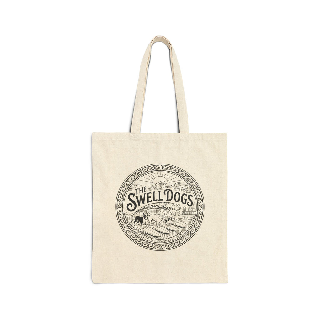 Beige tote bag with a Swell Dogs logo.