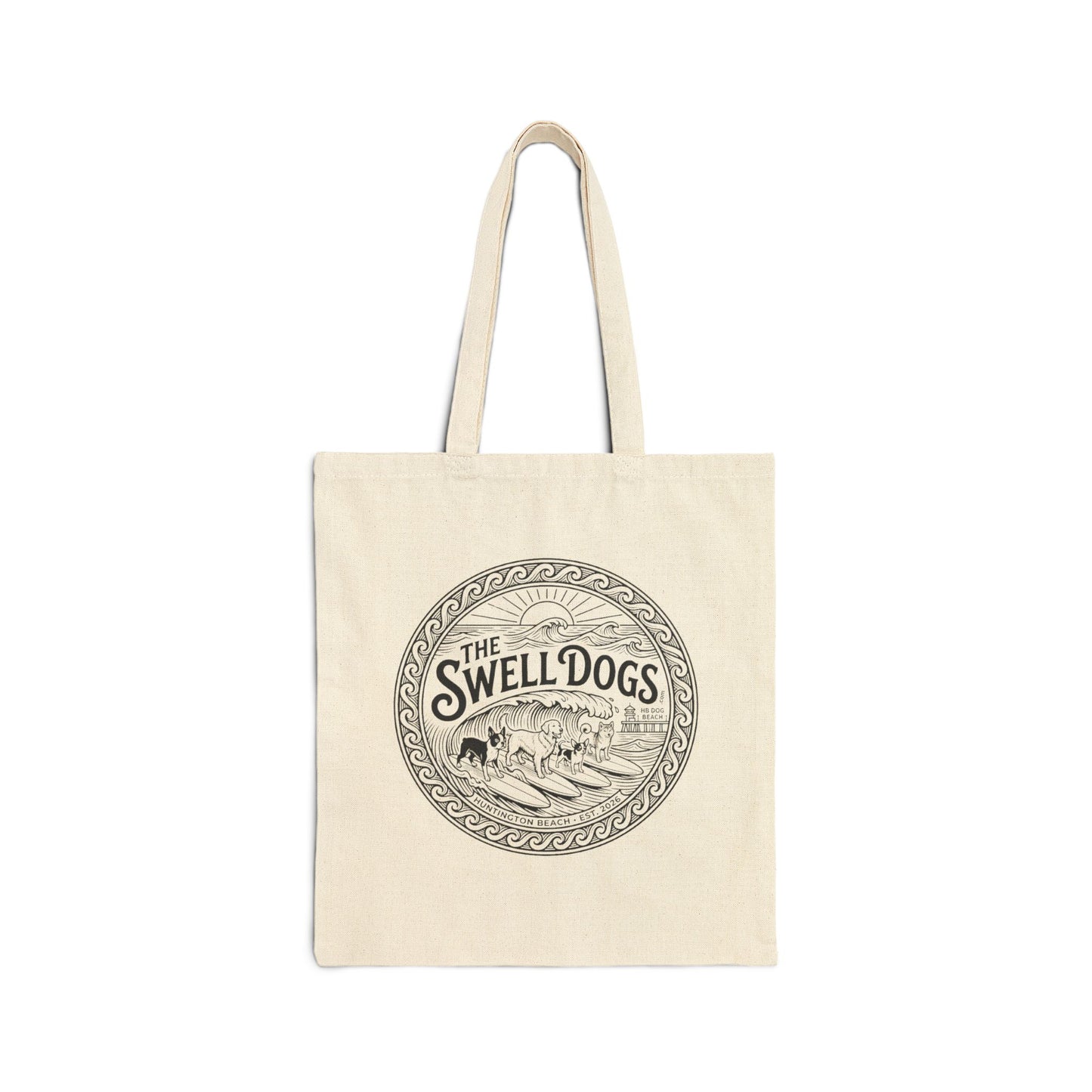 Beige tote bag with a Swell Dogs logo.