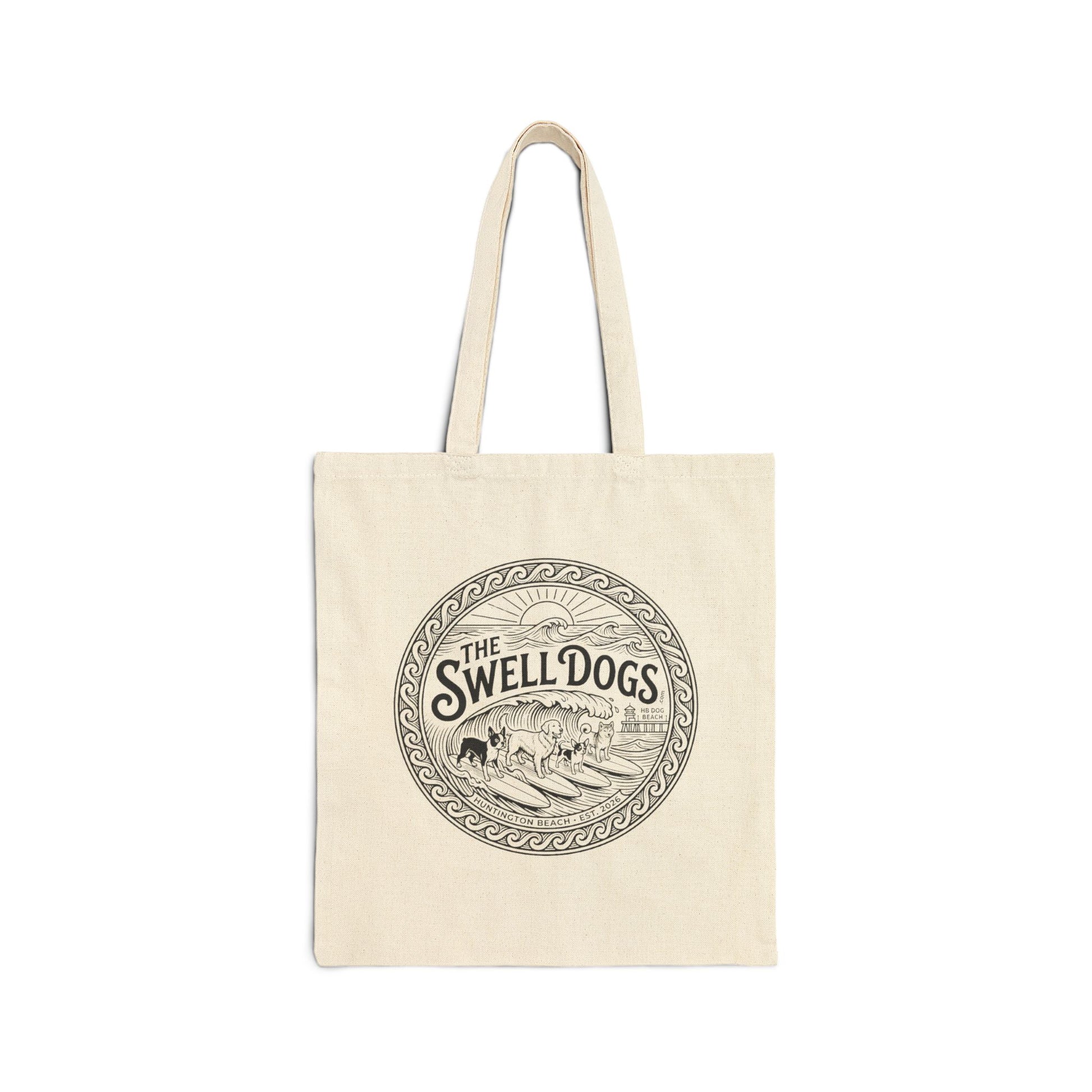 Beige tote bag with a Swell Dogs logo.