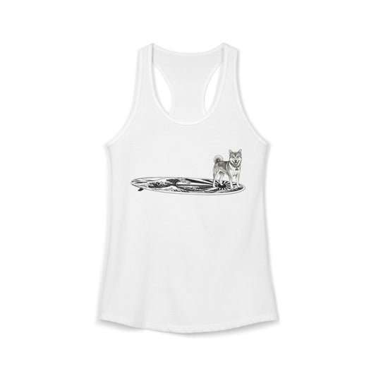 White racerback tank top with a Shiba Inu dog on a surfboard with a graphic of a Japanese wave and sun flag on it.