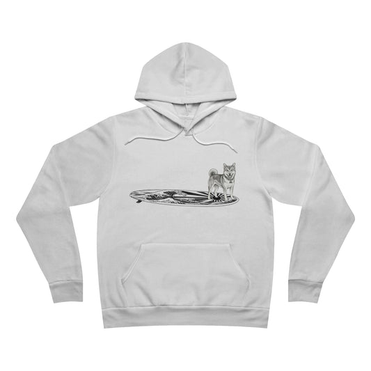 White hoodie with a graphic of a Shiba Inu on a Japanese Rising Wave surfboard. 