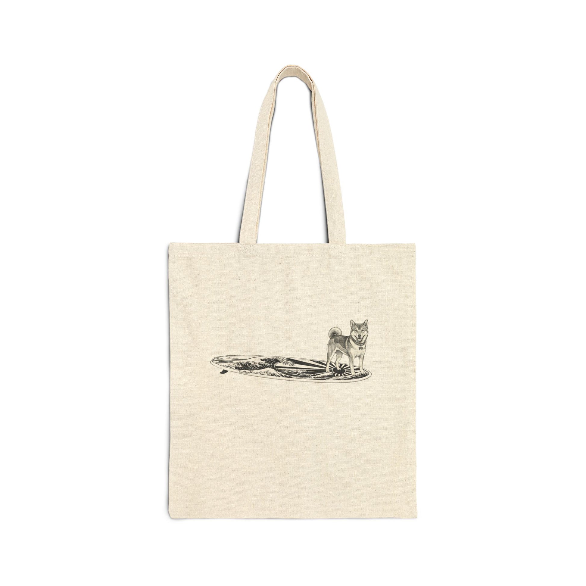 Natural canvas tote bag with Shiba Inu surfboard illustration, rising wave and Japanese sun flag design in vintage black line art — The Swell Dogs