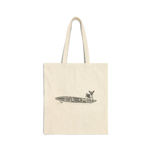 Beige tote bag with a Chihuahua surfing on a Day of the Dead surfboard.