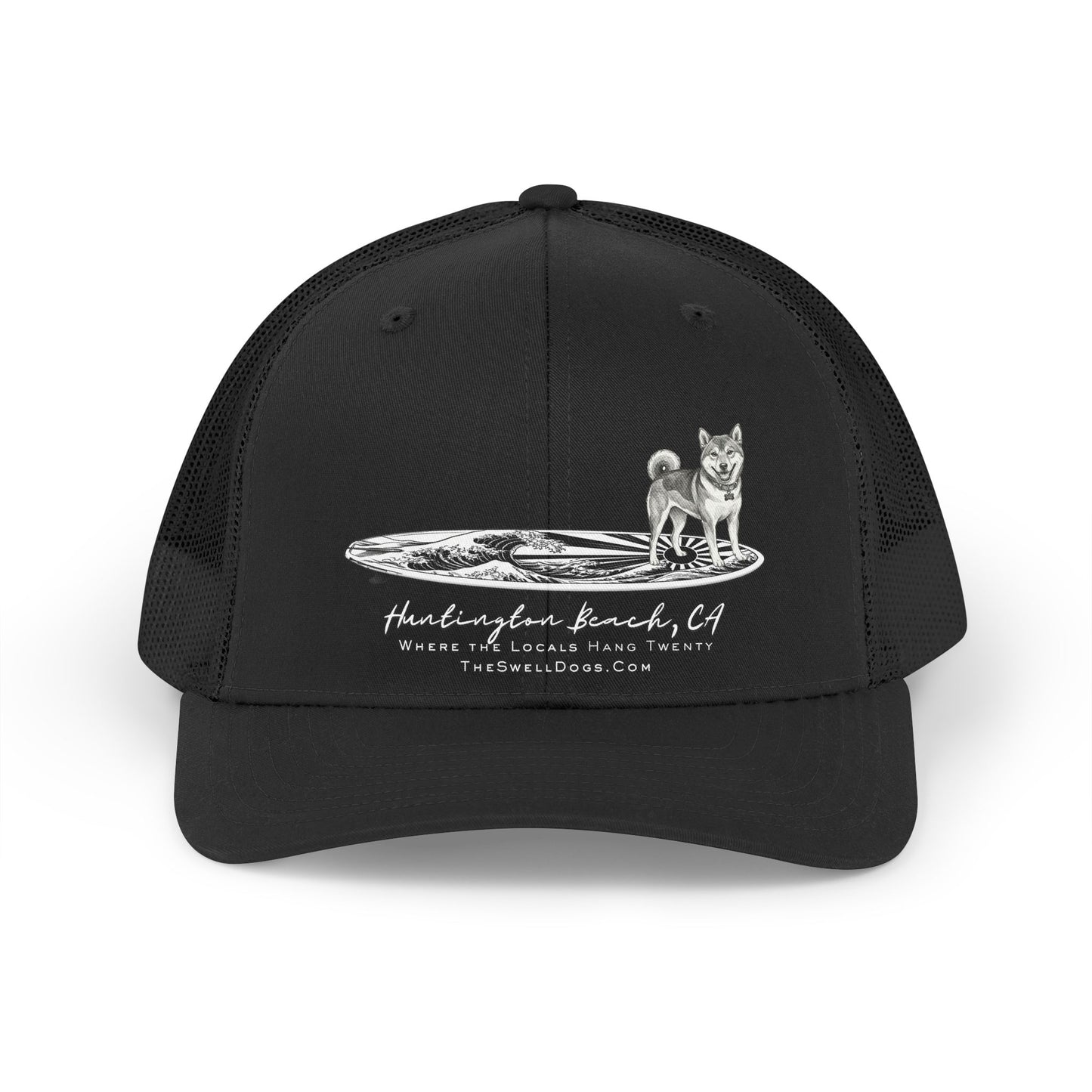 Black trucker hat featuring a Shiba Inu dog standing on a Japanese surfboard with "Huntington Beach, CA" text