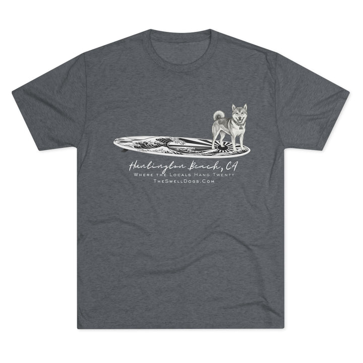 Grey t-shirt featuring a Shiba Inu on a Japanese surfboard with "Huntington Beach, CA" text