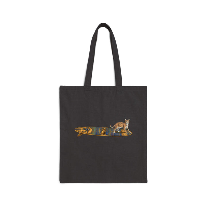 Black tote bag featuring a tabby cat standing on an Egyptian surfboard